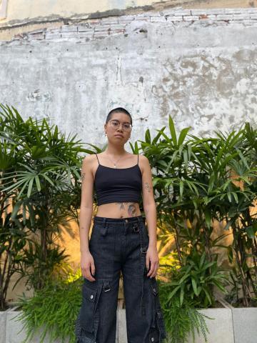 person standing in front of plants